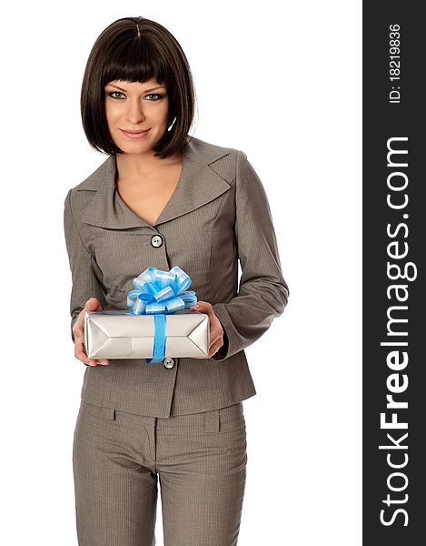 Woman holding a grey box with blue bow as a present. Woman holding a grey box with blue bow as a present