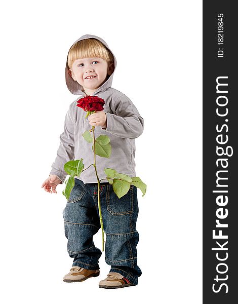 Little beautiful boy with red rose
