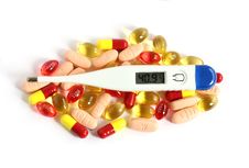 Digital Thermometer On Pills And Tablets Royalty Free Stock Images Digital Thermometer On Pills And Tablets Royalty Free Stock Images