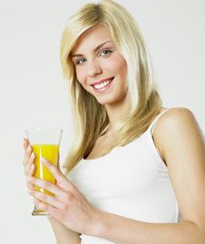 Woman With A Glass Of Juice Royalty Free Stock Photography Woman With A Glass Of Juice Royalty Free Stock Photography