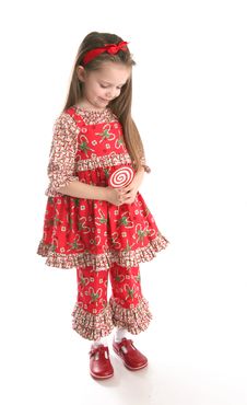 Cute Little Girl In Christmas Wear Royalty Free Stock Photos