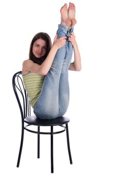 Girl Sit On Stool Take Legs Up. Royalty Free Stock Images Girl Sit On Stool Take Legs Up. Royalty Free Stock Images
