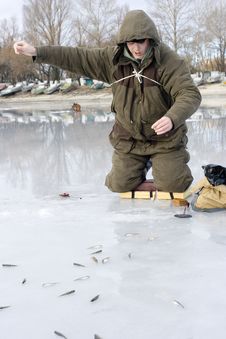 Fisherman. Ice Fishing Competition Stock Photos Fisherman. Ice Fishing Competition Stock Photos