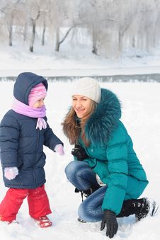 Mother And Kid Having Fun Outdoors On Winter Day Stock Images Mother And Kid Having Fun Outdoors On Winter Day Stock Images