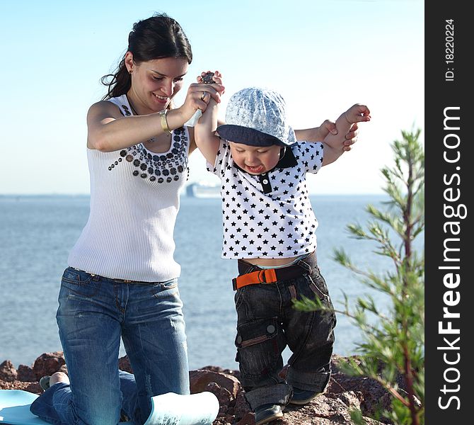 Picnic of happy family near sea. Picnic of happy family near sea