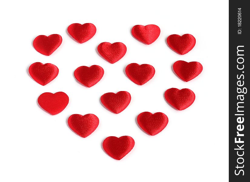 Heart shape made from many small red hearts isolated on white background. Heart shape made from many small red hearts isolated on white background