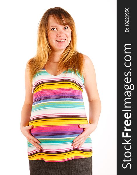 Beautiful pregnant woman staying on white background