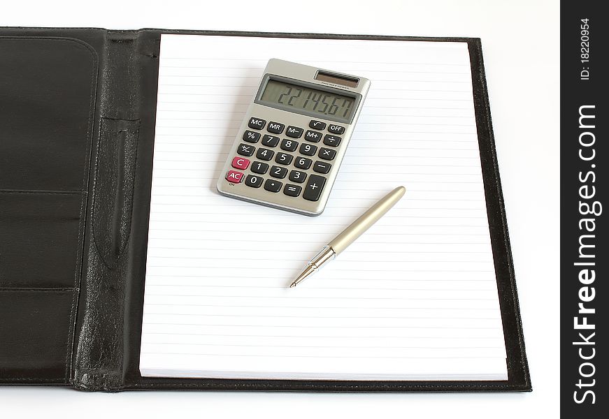 Leather folder with notebook pen and calculator isolated on white background