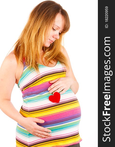 Beautiful pregnant woman staying on white background