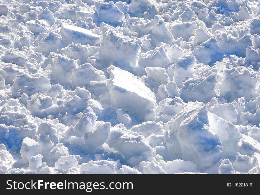 Crust of frozen pile with clumps of snow. Crust of frozen pile with clumps of snow