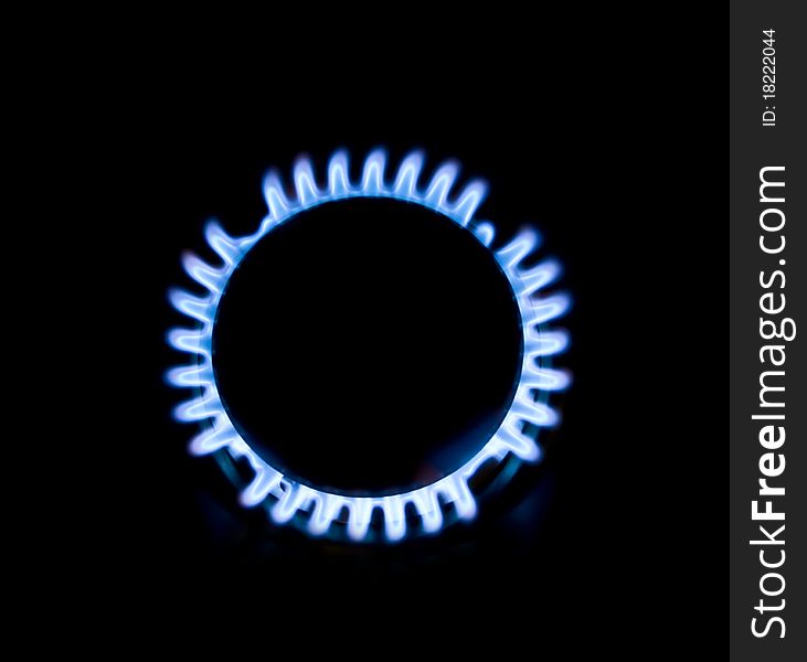 Blue gas stove in the dark