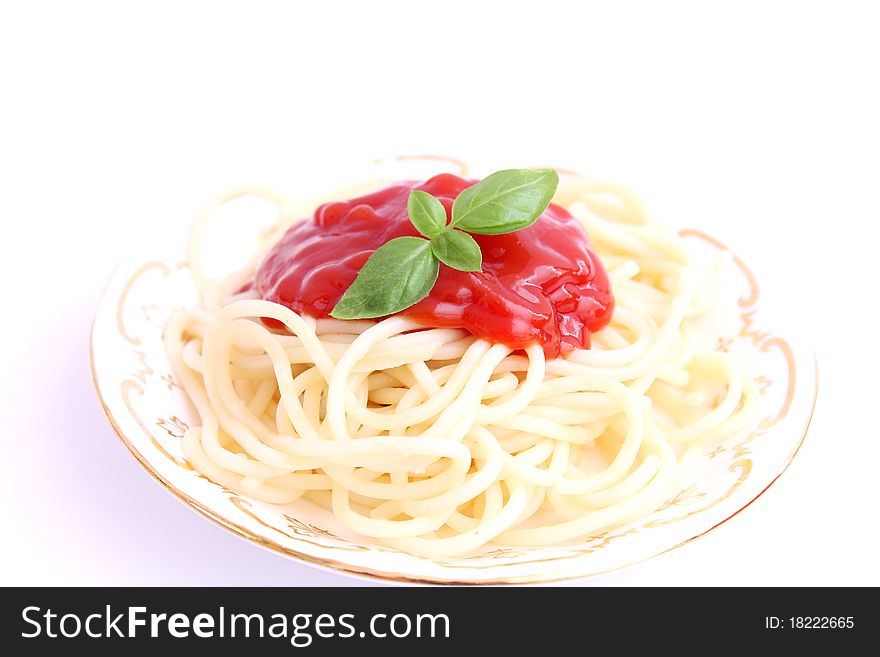 Spaghettis with sauce of tomatoes on a plate