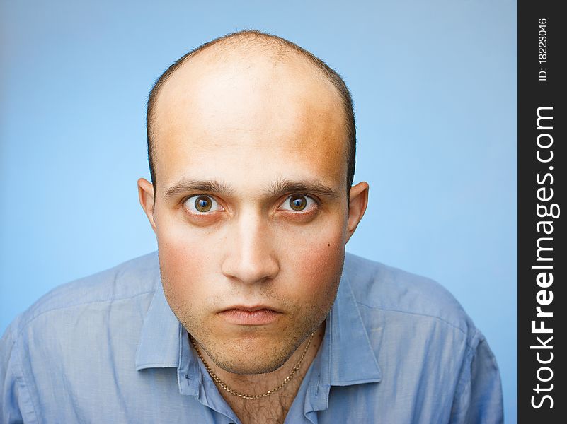 Pensive young man in shirt