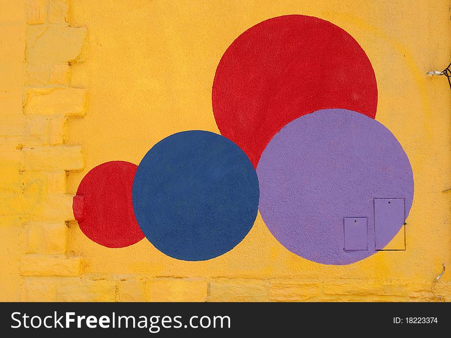 Colored circles painted on a wall