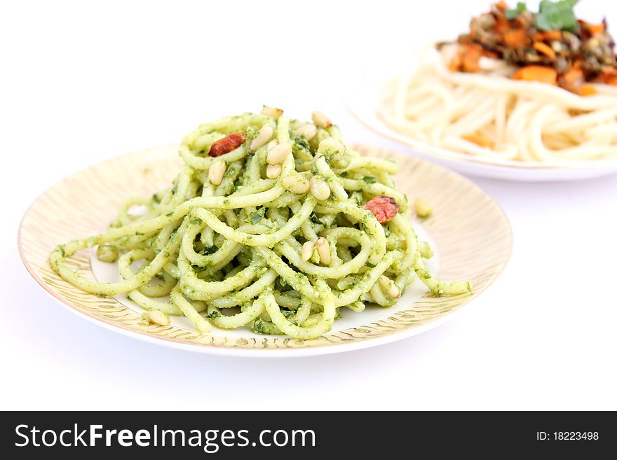 Spaghettis with pesto on a plate