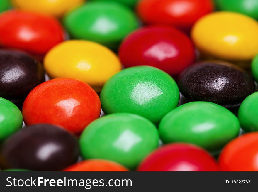 Background of colorful candies coated chocolate sweets