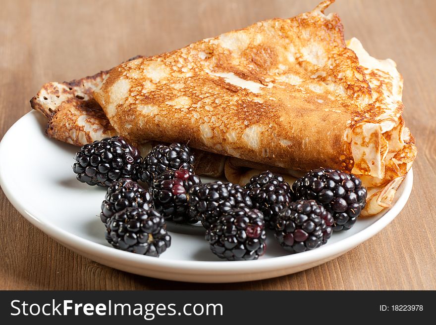 Plate of pancakes with fresh blackberries. Plate of pancakes with fresh blackberries