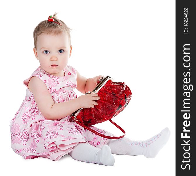 Little girl with shopping bag isolated on white