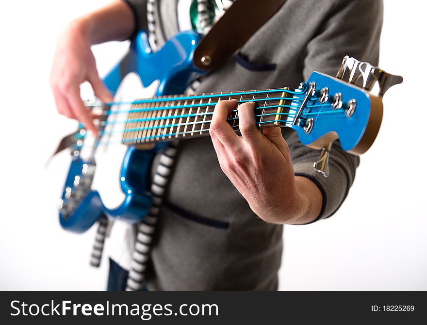 Man playing a guitar, isolated on white background