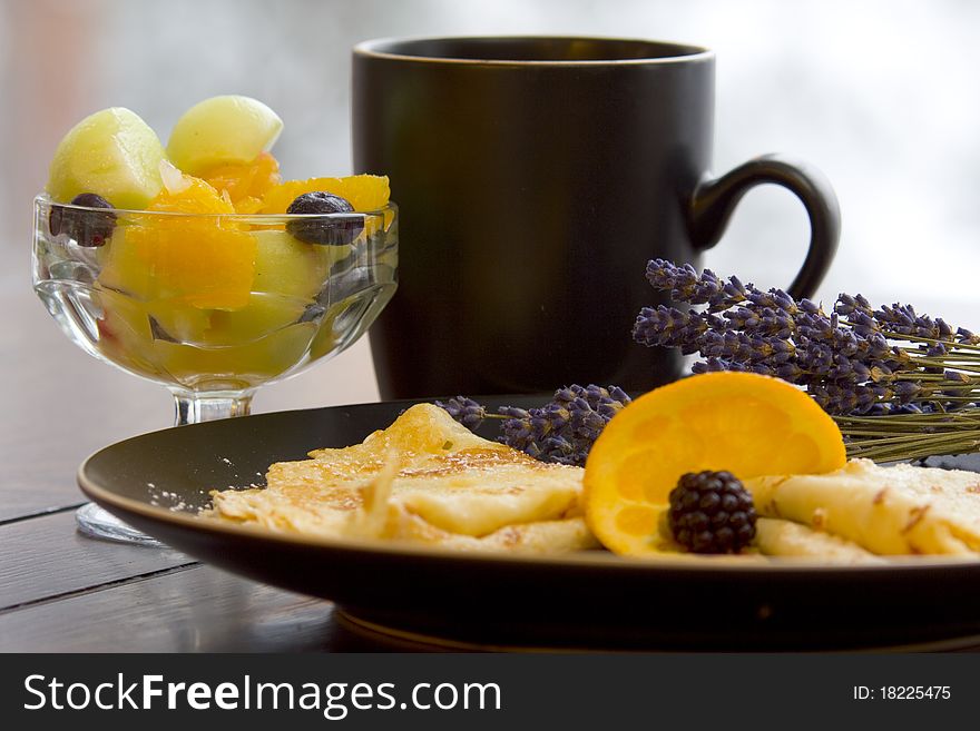 Beautiful fresh crepes and fruit over coffee. Beautiful fresh crepes and fruit over coffee