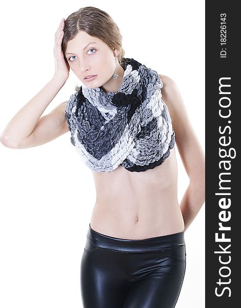 Fashion model posing in leggings and a scarf