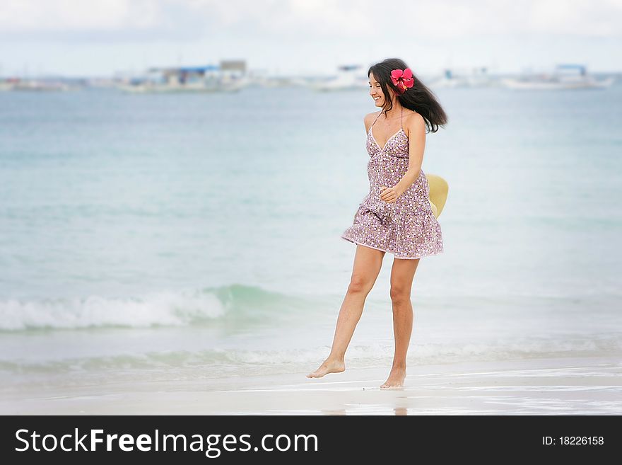 Young attractive woman on beach