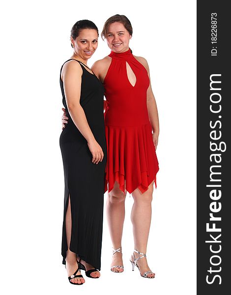 Two girls in dresses posing isolated