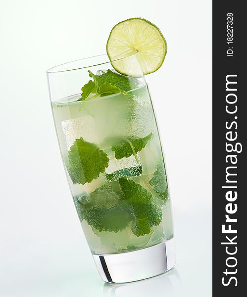 Mojito cocktail with lime closeup