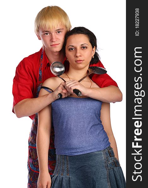 Young Man And Woman Embraces With Utensil