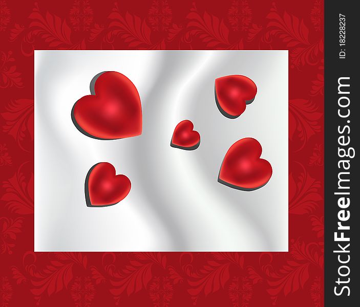 Red hearts on the silk floral background. Red hearts on the silk floral background