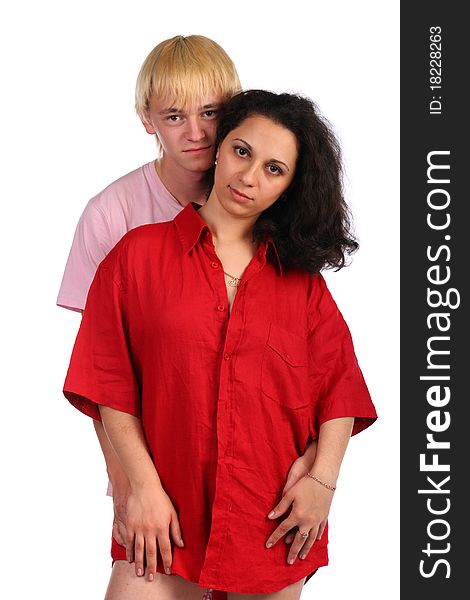 Young man embrace girl in red male shirt. Isolated