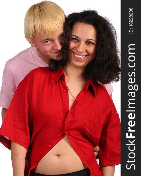 Young man embrace girl in red male shirt. Isolated