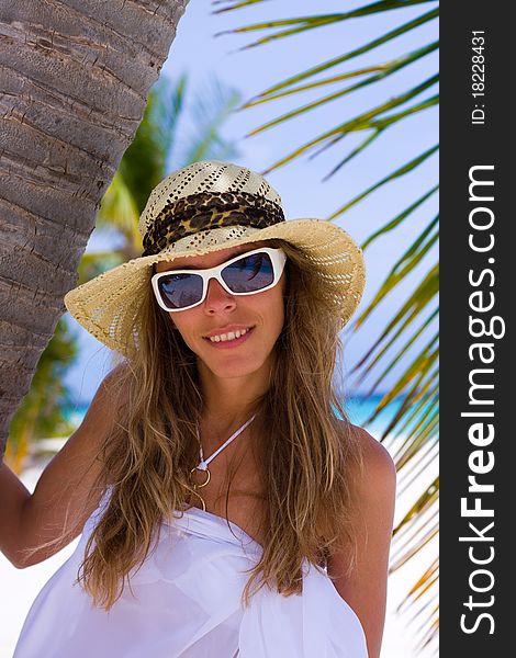 Young Woman On A Tropical Beach