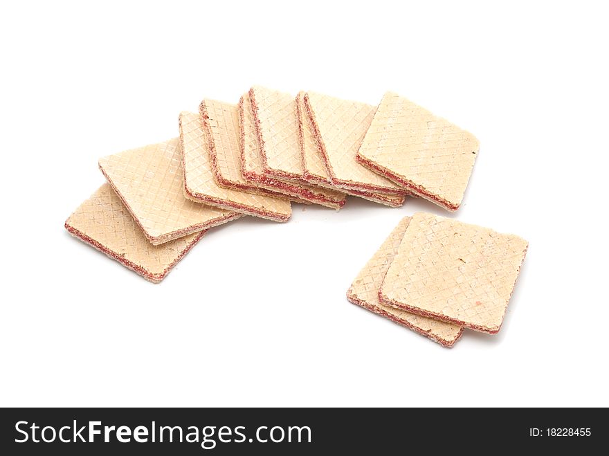 Wafers with an apricot layer on a white background