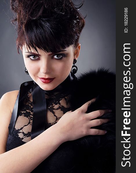 Portrait of a gorgeous woman in black furs