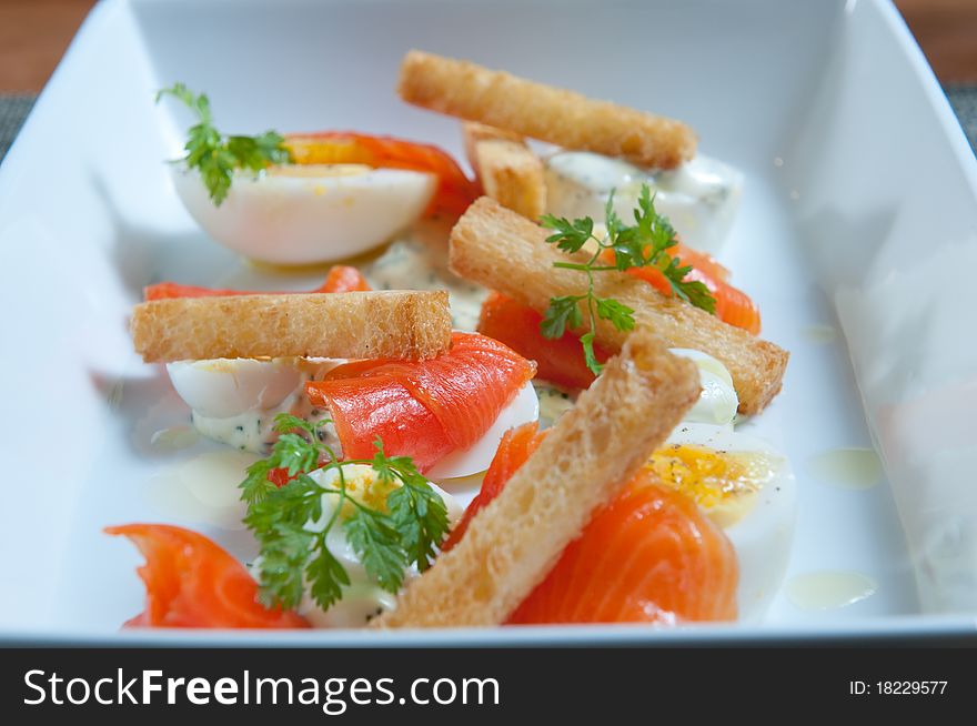 Fresh smoked salmon with eggs and toast