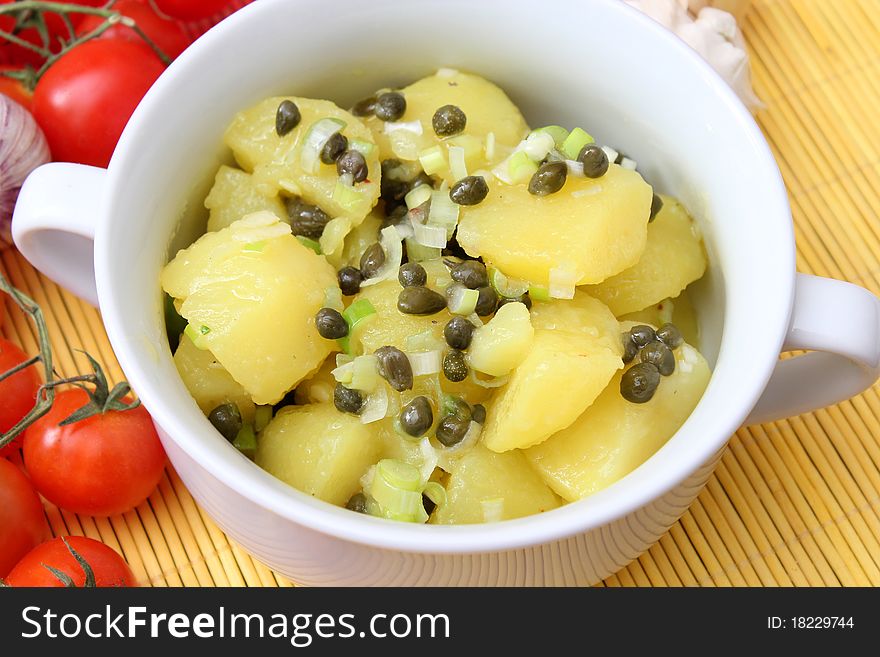 A fresh salad of potatoes and capers