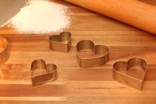 Cookie Cutters, Rolling Pin & Sifted Flour On Cutt Stock Photo Cookie Cutters, Rolling Pin & Sifted Flour On Cutt Stock Photo