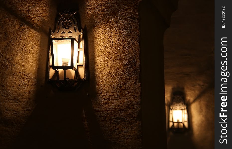 Lamps in an old building's wall. Lamps in an old building's wall