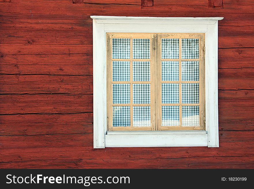 A timber house's window with curtain. A timber house's window with curtain.