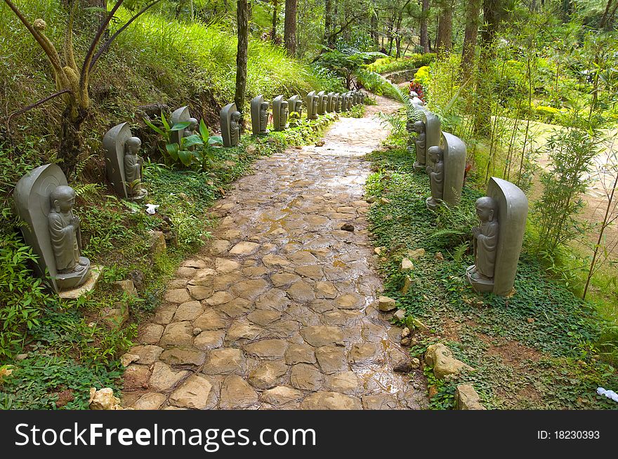 Stone Figures in Meditation in Japanese Garden. Stone Figures in Meditation in Japanese Garden