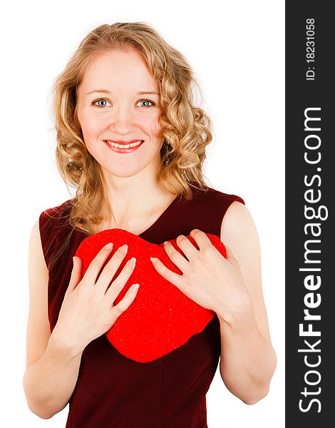 Charming young woman with a red heart on a white background