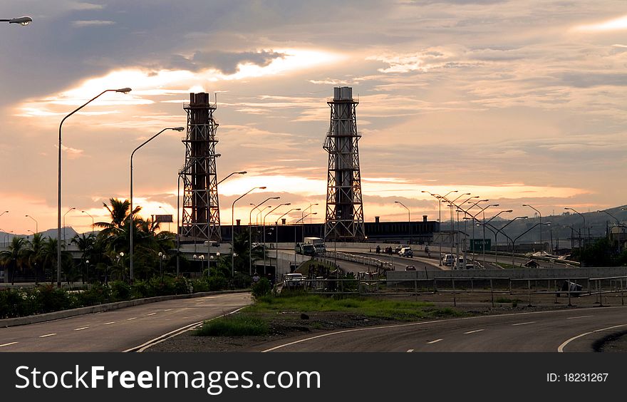 A landscape of an industrial plant on a twilight. A landscape of an industrial plant on a twilight