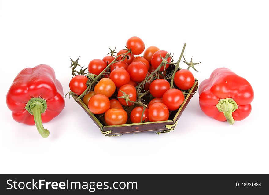 Cherry tomato and red pepper, on a white background