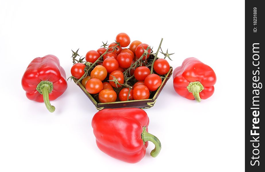 Cherry tomato and red pepper, on a white background