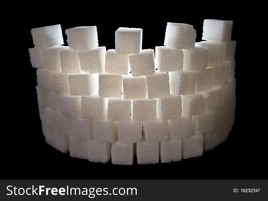 A white tower made from sugar cubes. A white tower made from sugar cubes
