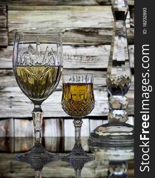 Wine Glasses And Cabin Wall Background