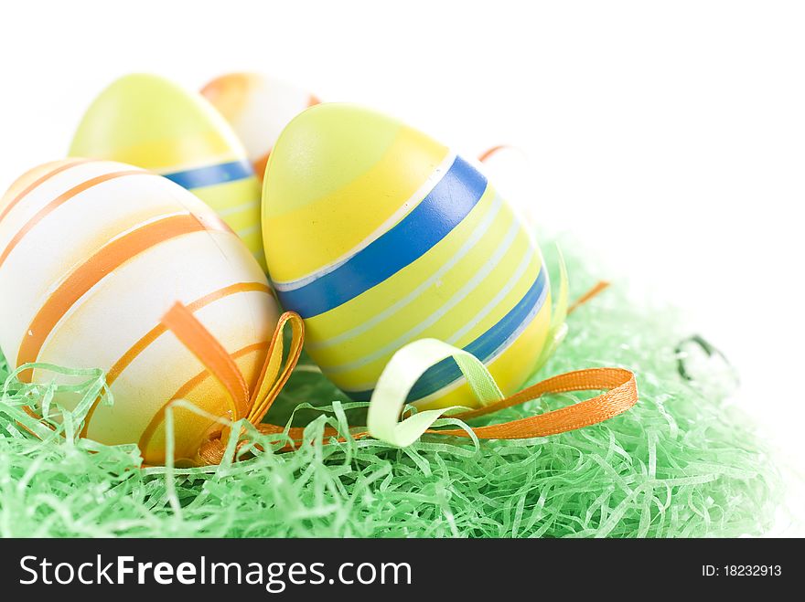 Colorful Easter Eggs on green Grass