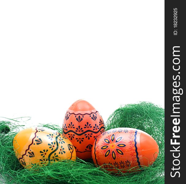 Colorful Easter Eggs on green Grass