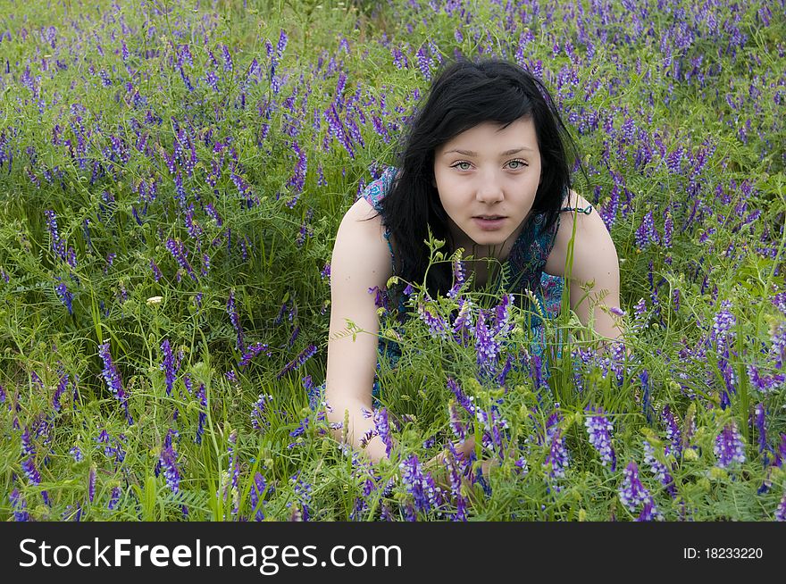 Young Black Hair Girl in Blue Flowers